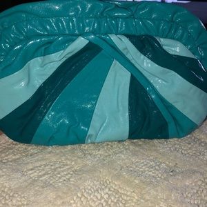 Clutch. Color is teal